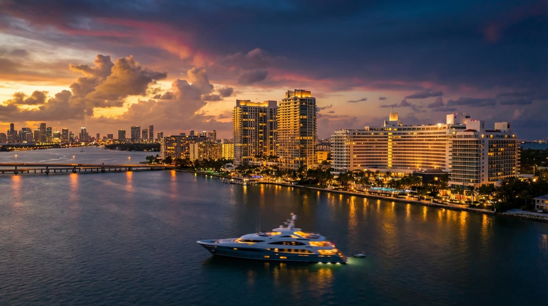 Miami skyline at twilight with yacht in Biscayne Bay